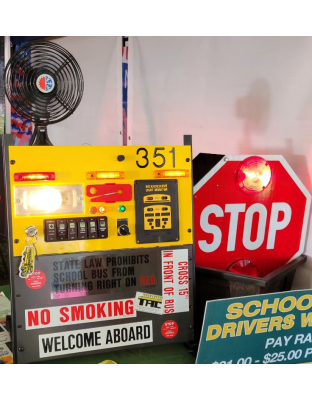 School Bus Simulator in use at a County Fair for driver recruitment